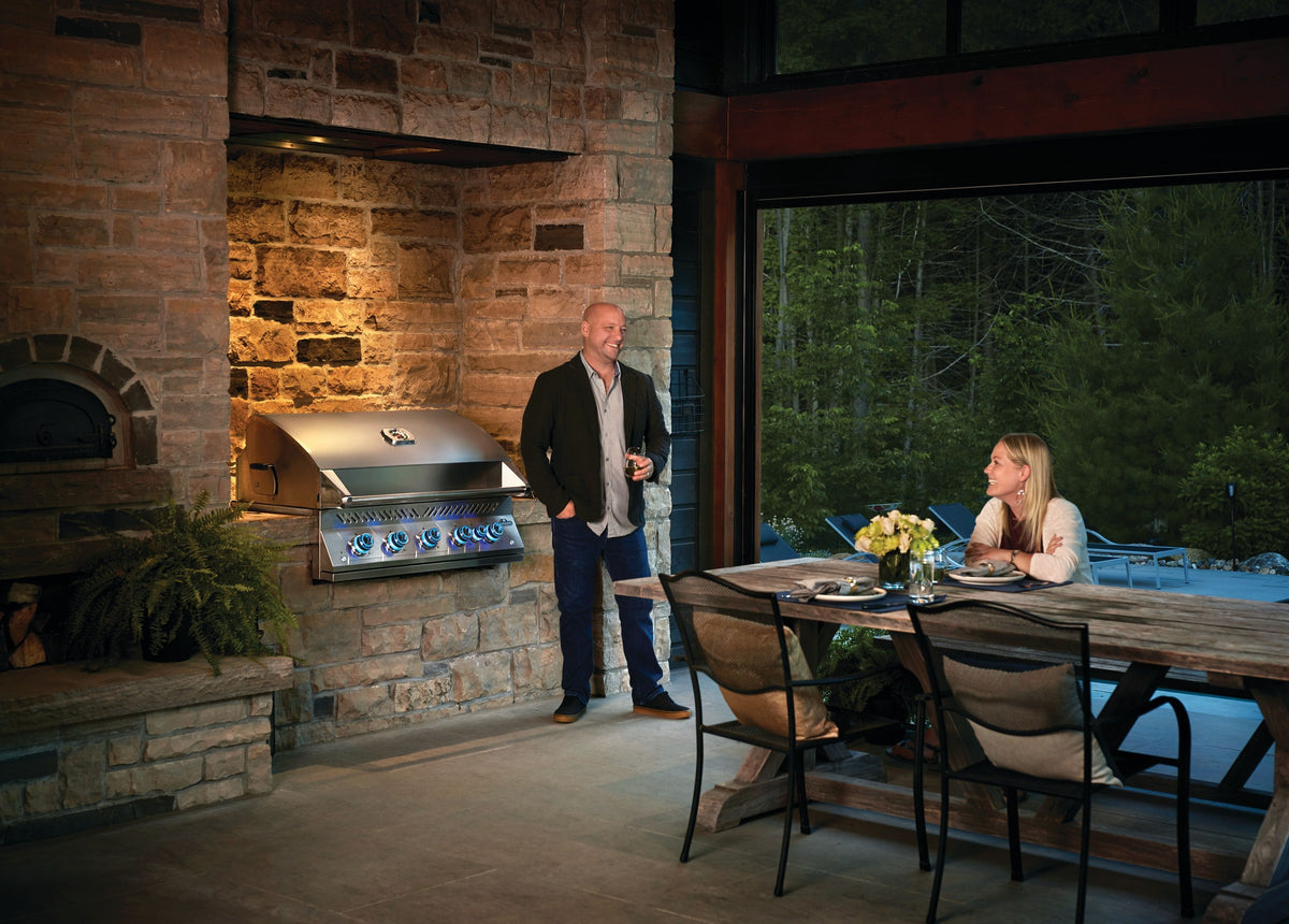 Napoleon Built-In 700 Series 38-inch gas grill in a poolside outdoor kitchen