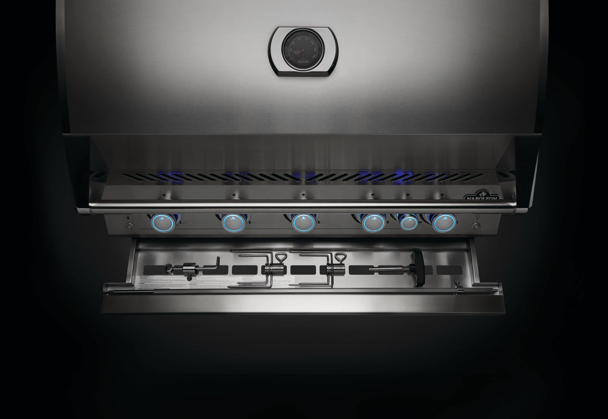 Napoleon Built-In 700 Series grill control panel with backlit knobs and rotisserie storage