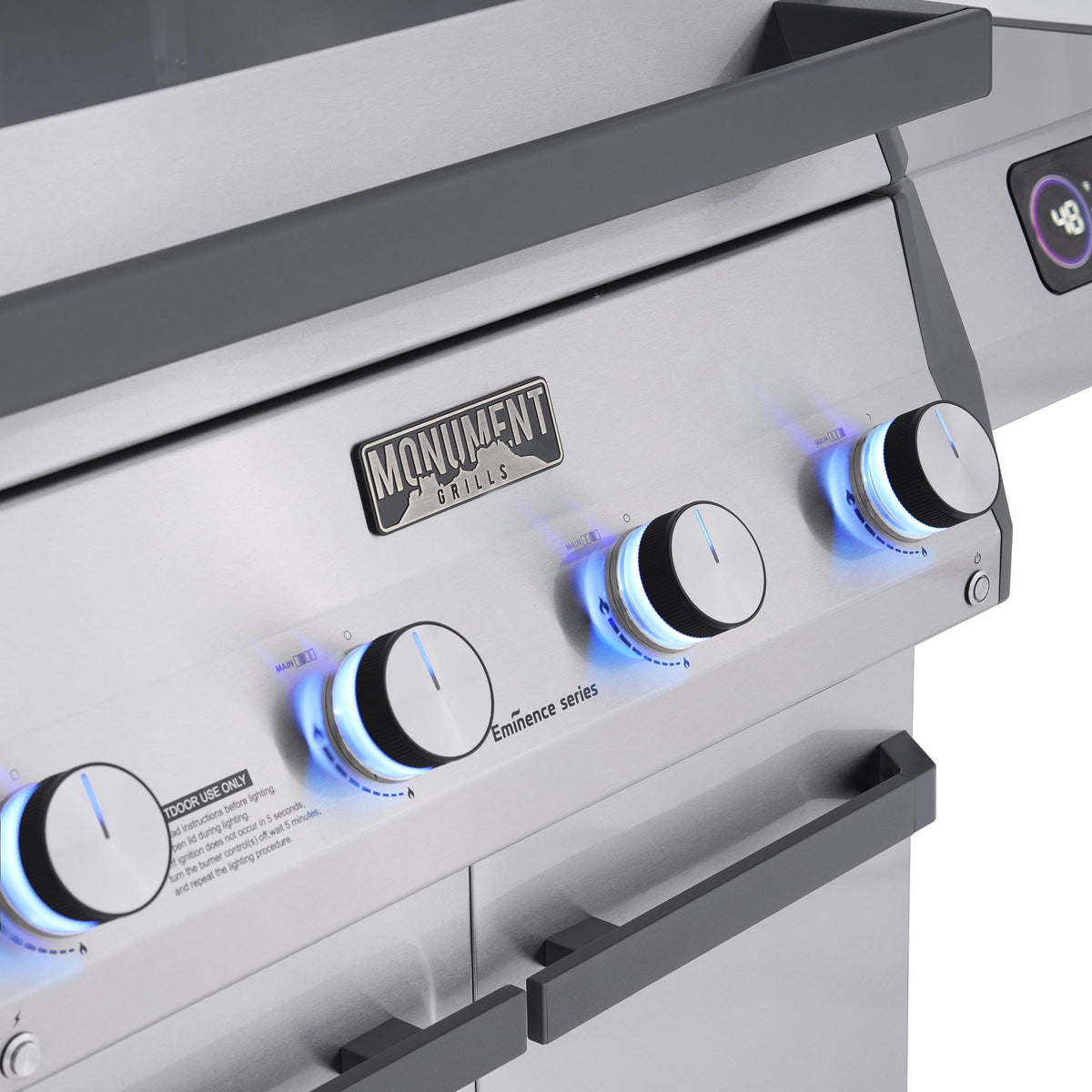 Monument Grills Eminence 405 gas grill, knob lights glowing blue