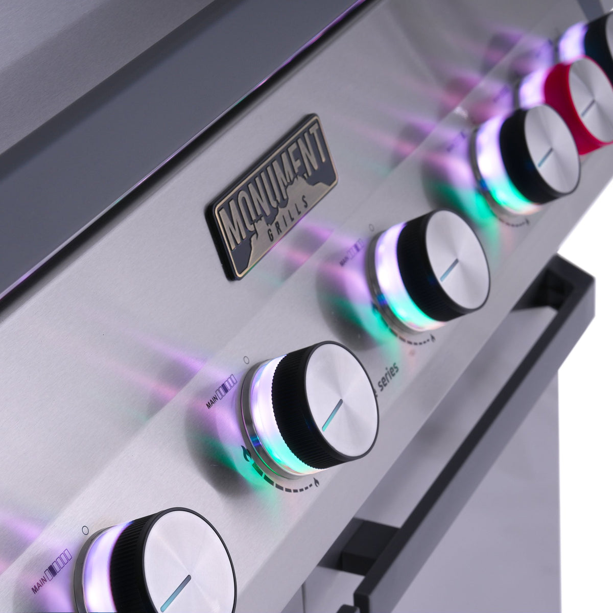 Monument Grills Eminence 605 gas grill, knob lights glowing purple