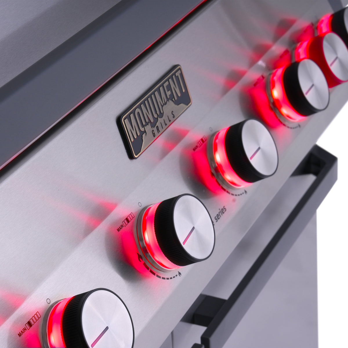 Monument Grills Eminence 605 gas grill, knob lights glowing red