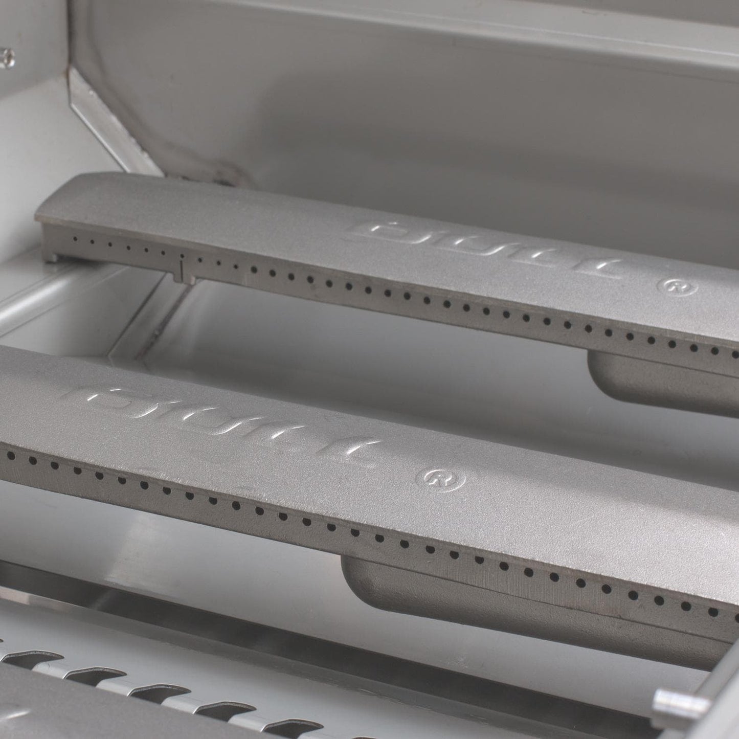 Cast stainless steel burners inside the Bull Brahma gas grill