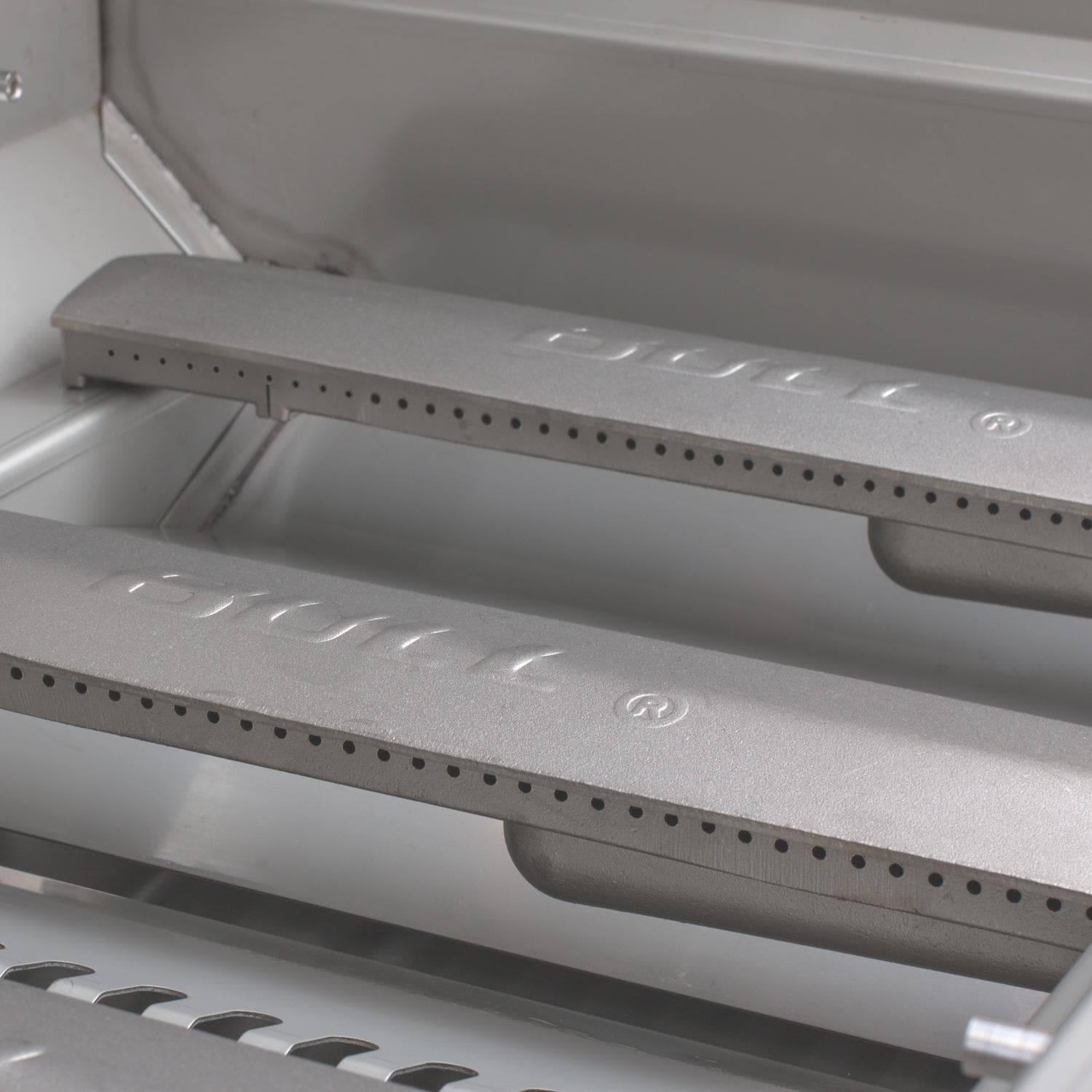 Cast stainless steel burners inside the Bull Brahma gas grill