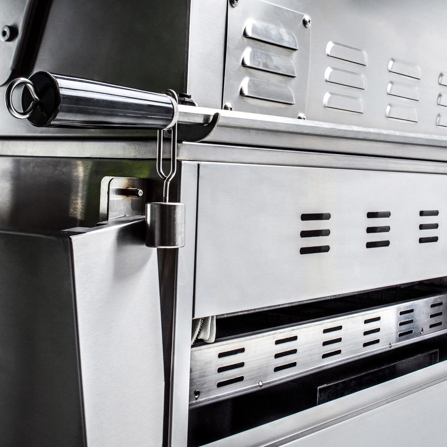 Rotisserie spit and counterweight assembly on the Blaze Professional LUX grill
