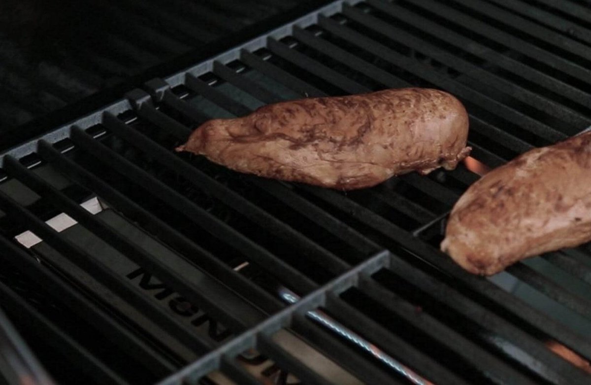 Monument Grills smoker box in use with chicken on the grill