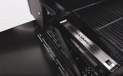 Monument Grills smoker box in a gas grill, close-up