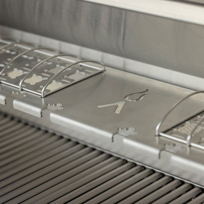 Multipurpose warming rack positioned above the grill grates
