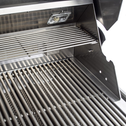 Open Blaze Professional LUX grill showing cooking rods, warming rack, and interior light