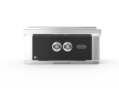 A Wildfire outdoor fireplace with a black front panel, two circular control dials, and a brushed silver metal frame, shown against a plain white background.