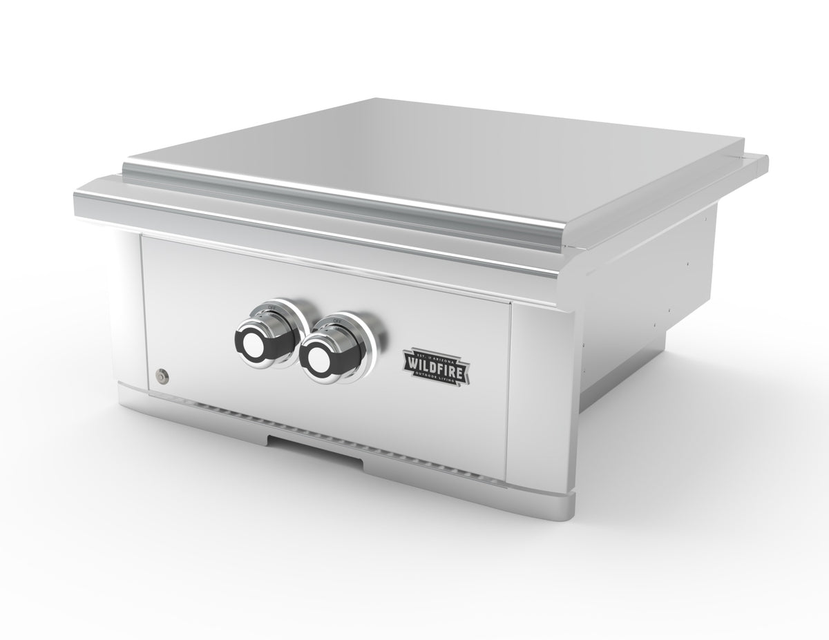 A stainless steel gas grill insert or burner kit with two front control knobs and a visible Wildfire brand badge, shown on a clean white background.