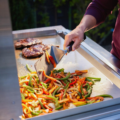 Cooking steak and vegetables on the Blaze LTE PRO 40-inch stainless steel griddle