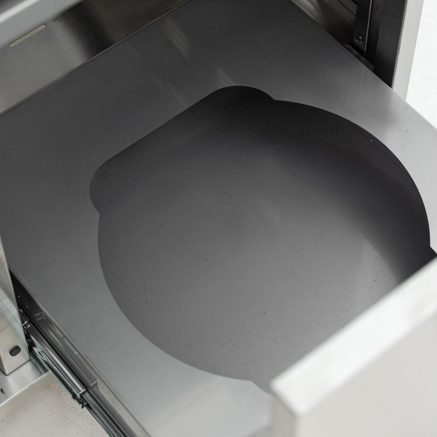 Pull-out propane-tank shelf inside the Blaze LTE PRO griddle cart