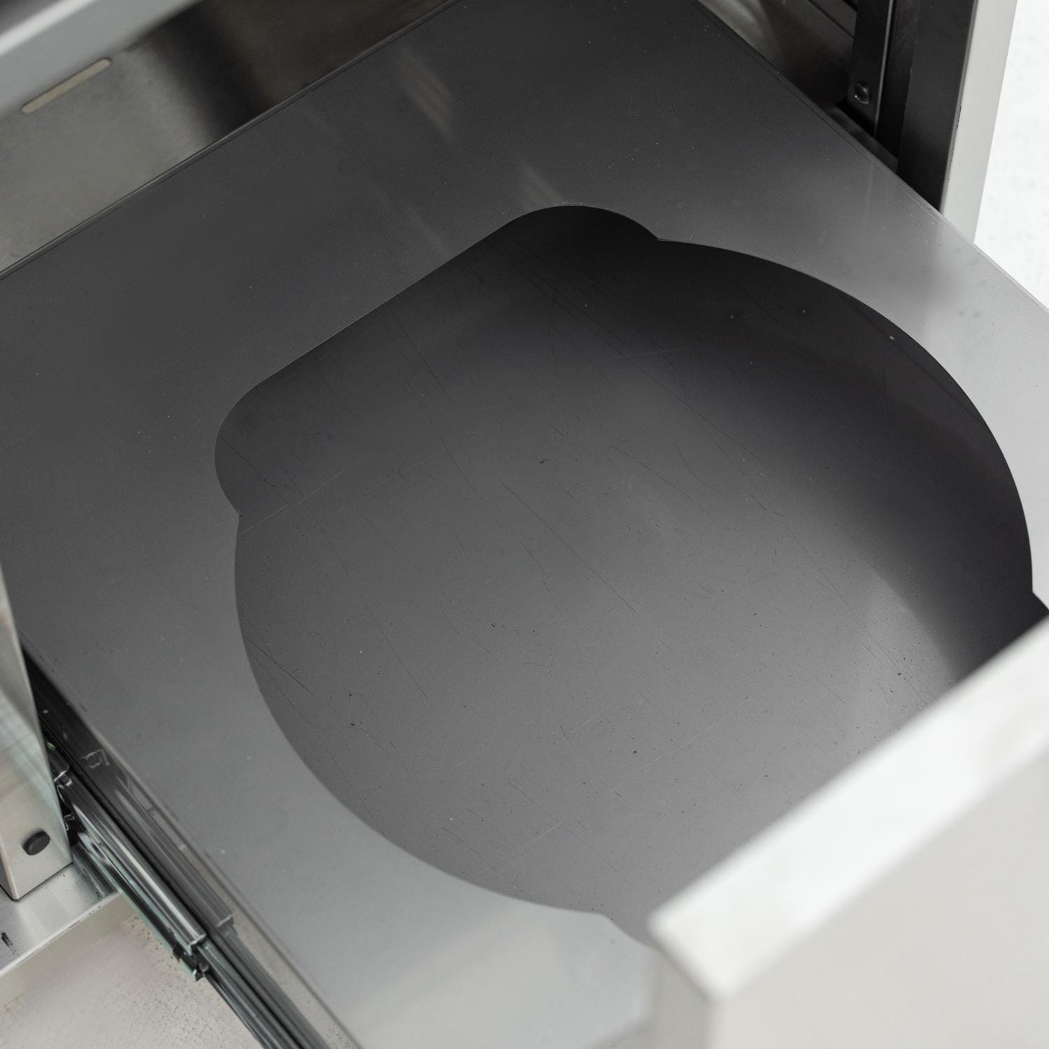 Pull-out propane-tank shelf inside the Blaze LTE PRO griddle cart