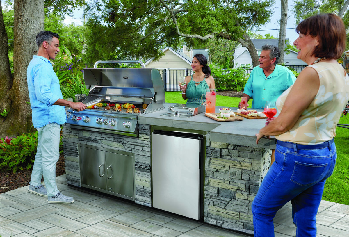 Bull Contemporary outdoor refrigerator in a stone outdoor kitchen island