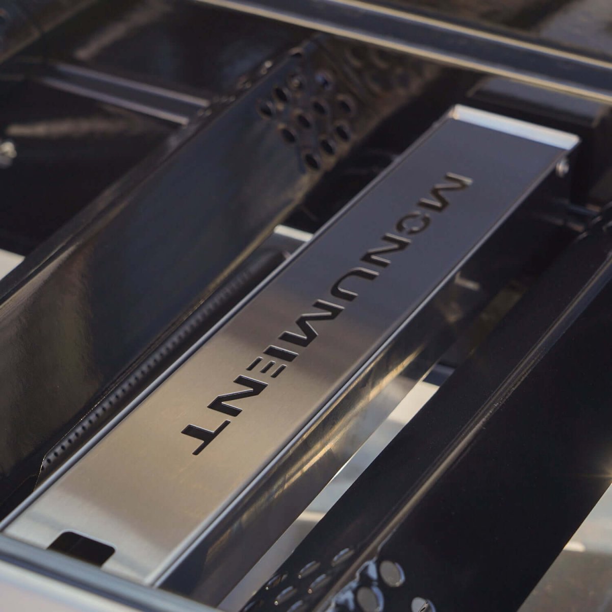 Monument Grills smoker box in a gas grill, side view