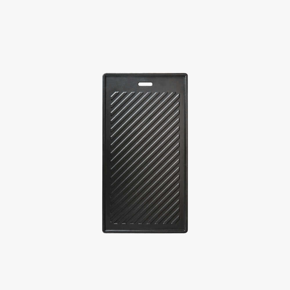 Monument Grills cast iron griddle on a gas grill