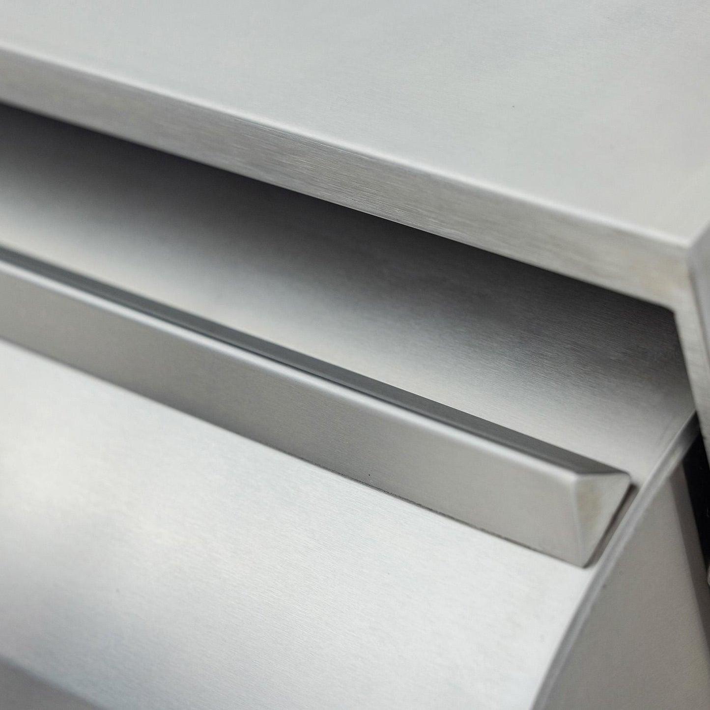 Stainless steel pull-out drawer handle on the Blaze LTE PRO grill cart