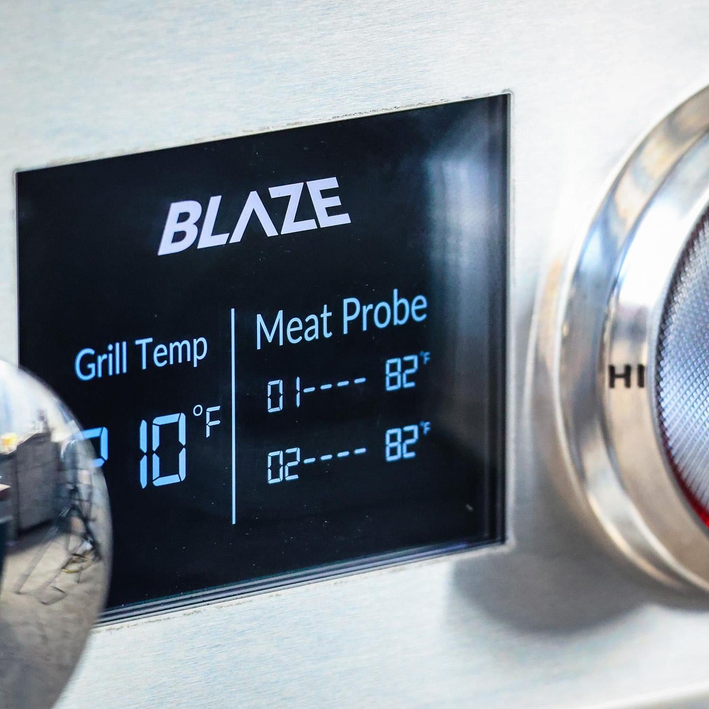 Digital temperature display showing grill temperature and two probe readings