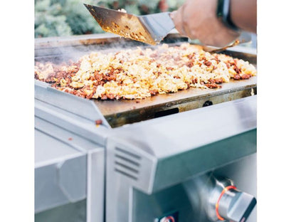 Breakfast cooking on the Summerset Griddle Pro stainless steel flat-top surface