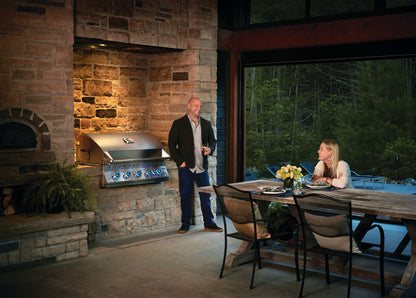 Napoleon Built-In 700 Series 38-inch gas grill in a poolside outdoor kitchen