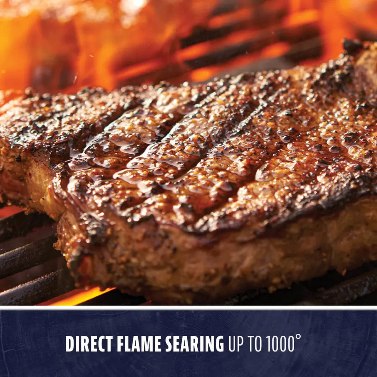 Steak searing over direct flame on a Pit Boss pellet grill