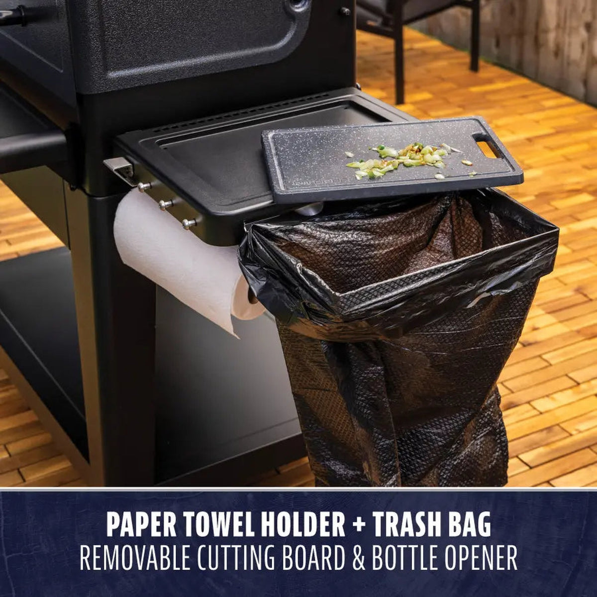 Pit Boss Navigator 1600 side shelf with paper towel holder, trash bag holder, cutting board, and bottle opener