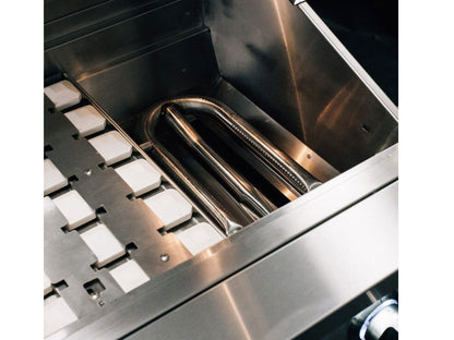 Easy-clean briquette system above the Quest grill burners