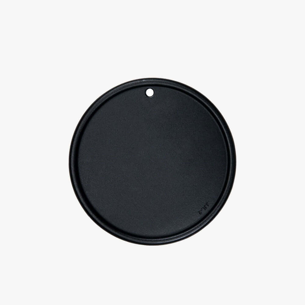 Monument Grills round cast iron cooking plate