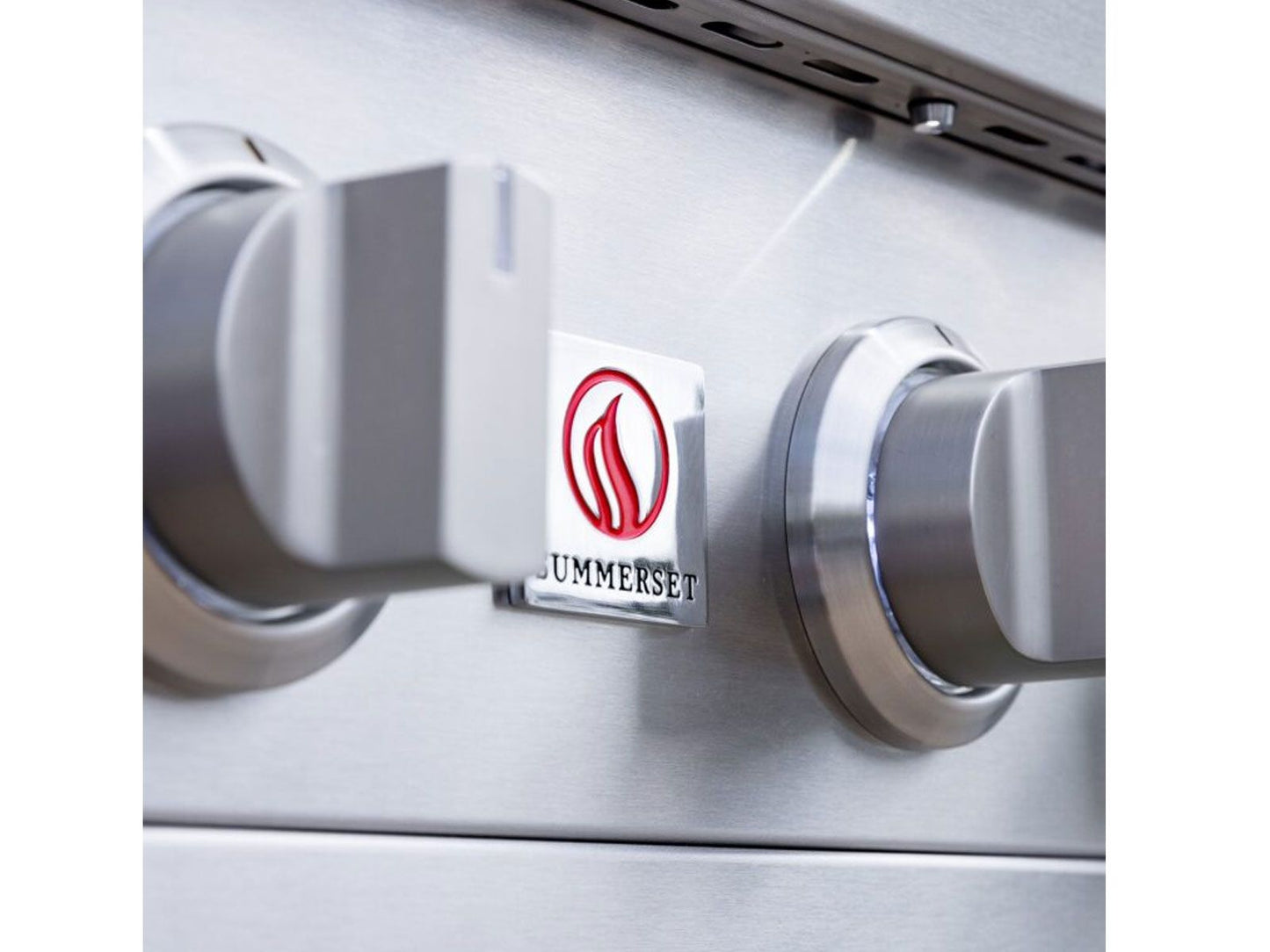 Folding side shelf and stainless steel deluxe cart on a Summerset Sizzler Pro gas grill
