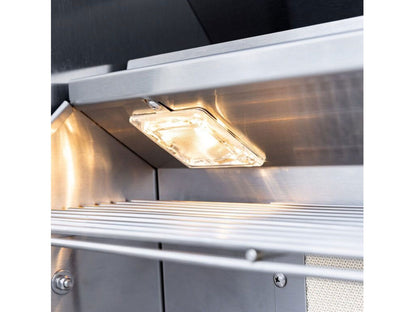 Easy-clean briquette system inside a Summerset Sizzler Pro gas grill